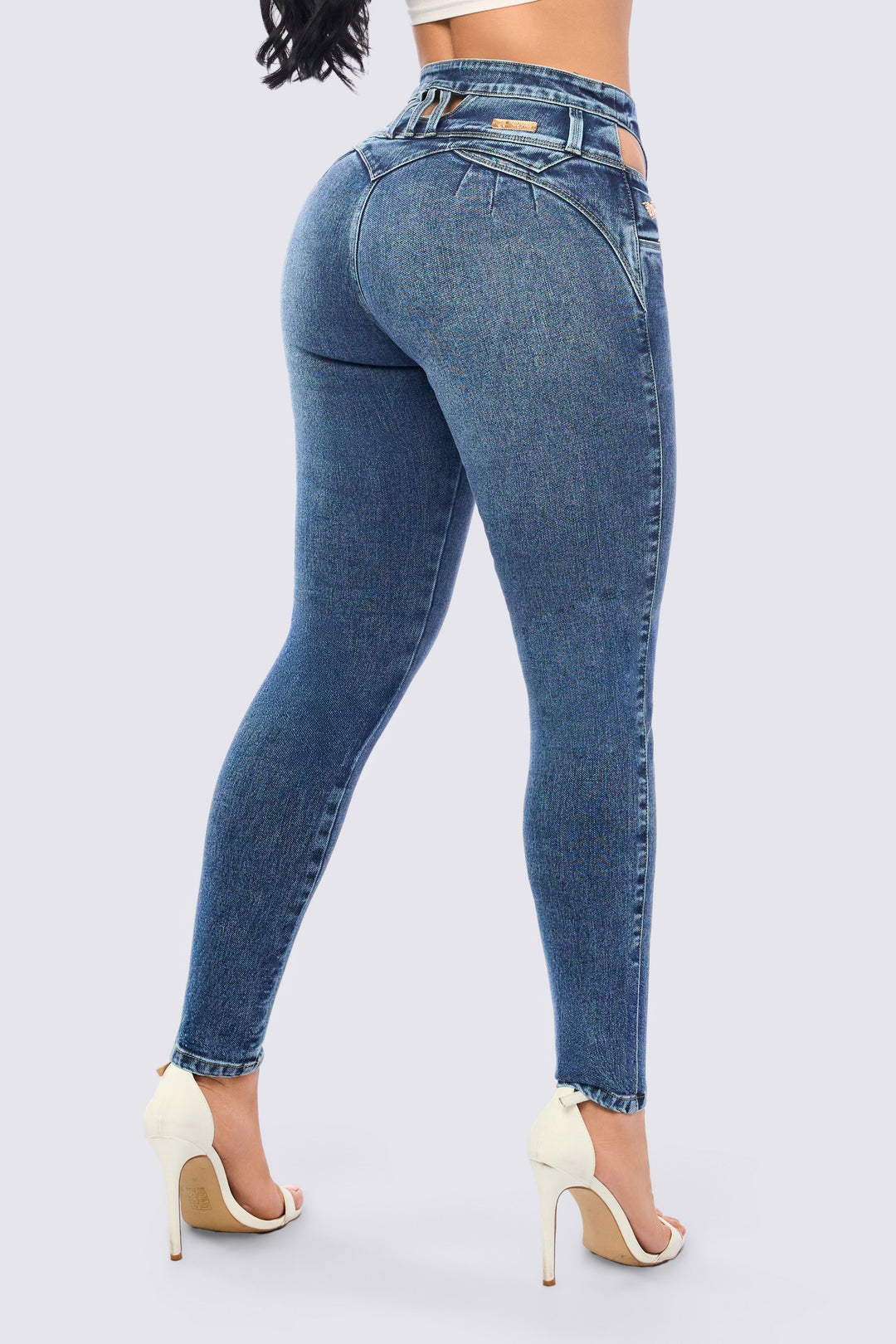 PANTALÓN SKINNY LEVANTA COLA  Y CUTS-OUTS EN CADERA 7099