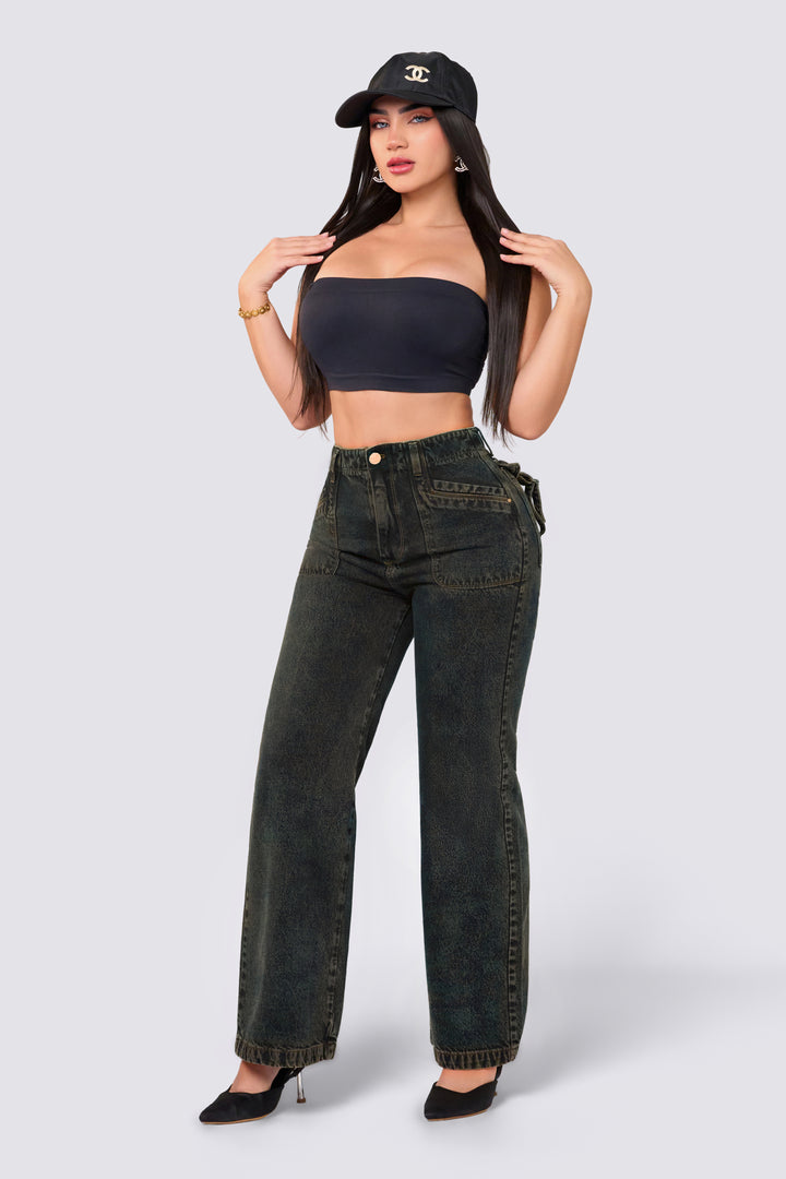 Jean estilo wide leg, con efecto acid wash, de tiro alto y color oscuro. 